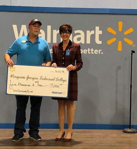 CTD Instructor Rodney Baggett receives check from Dr. Tina K. Anderson